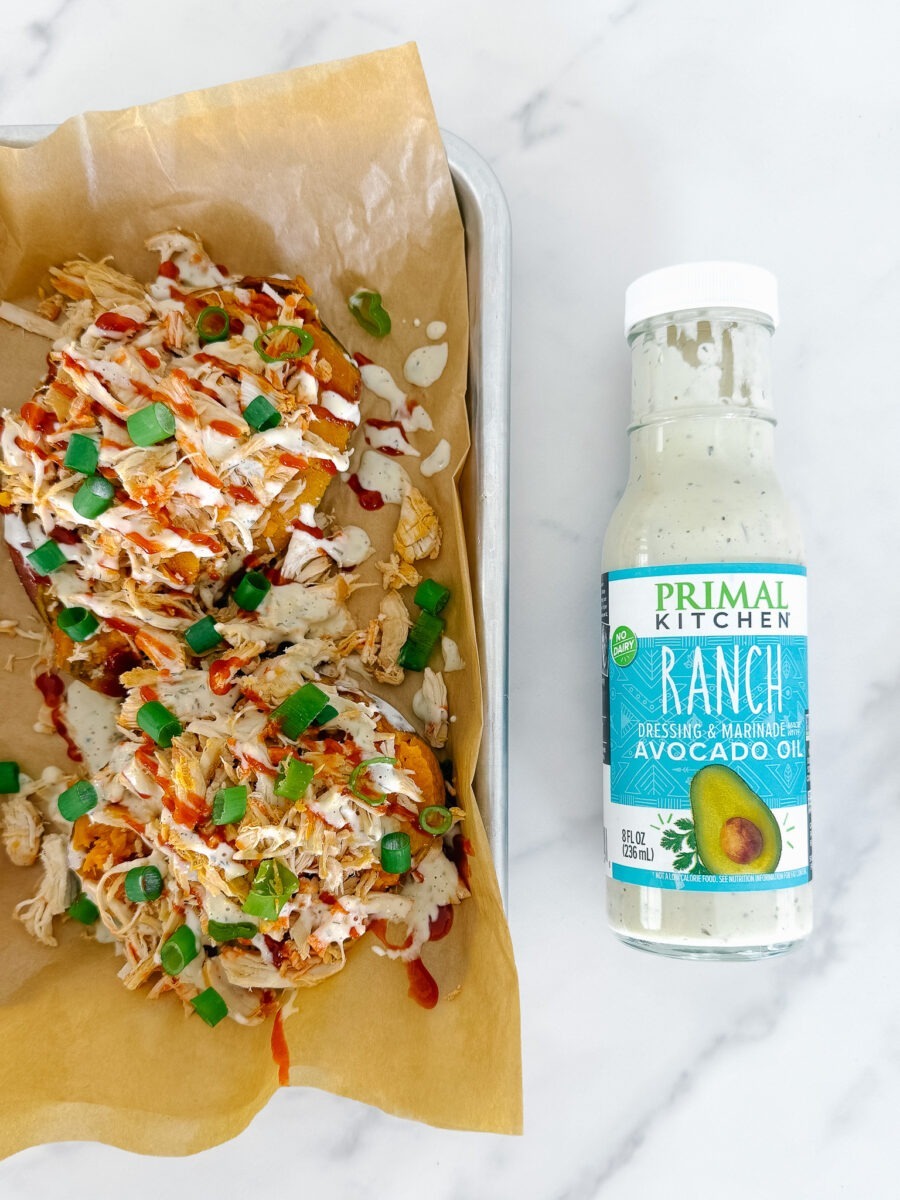 buffalo chicken sweet potatoes with primal kitchen ranch