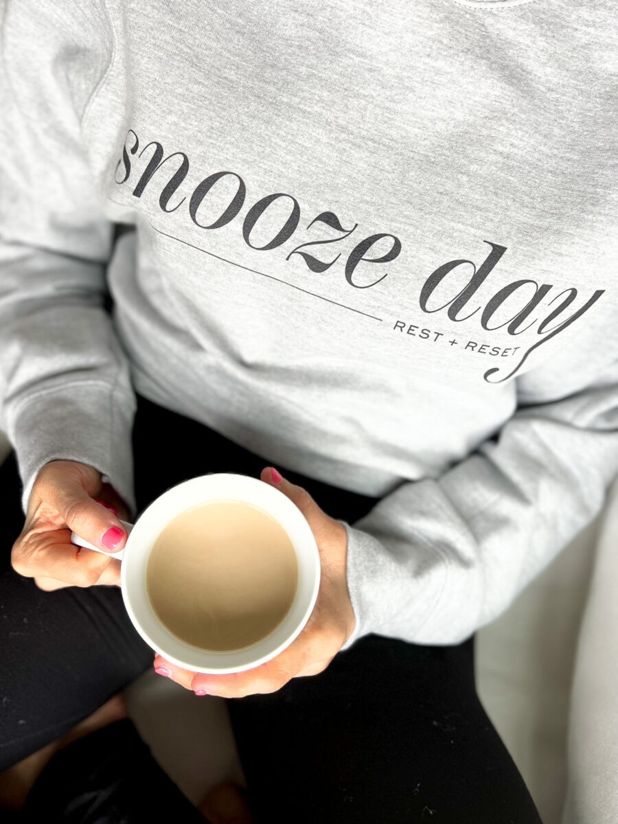 Snooze Day coffee and sweatshirt