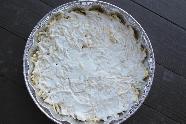 making baked spaghetti in a tin