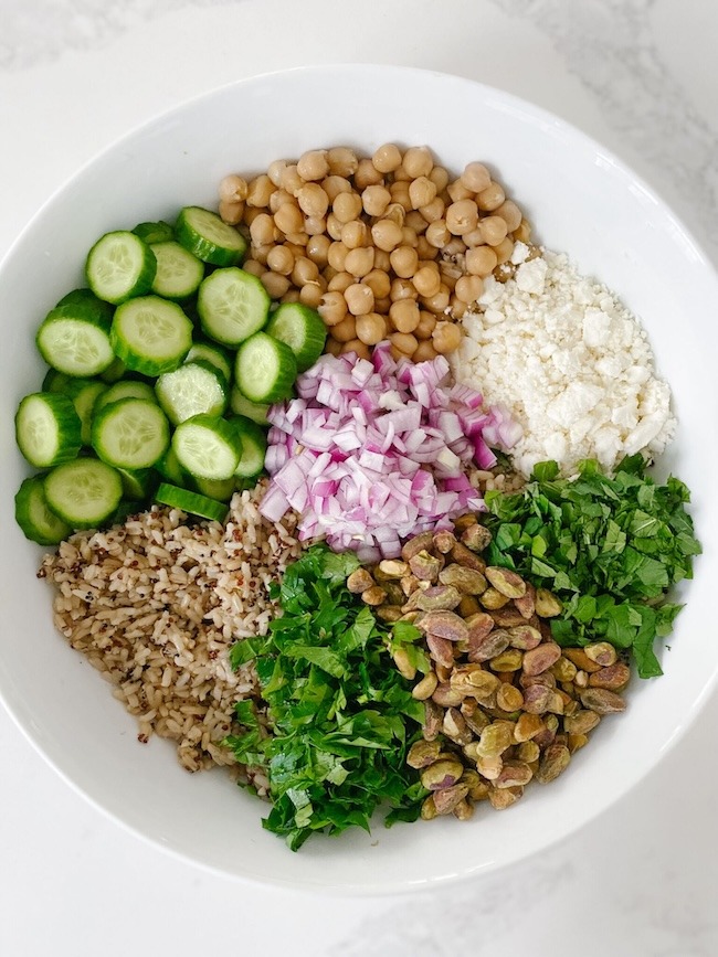 Jennifer Aniston Salad Ingredients The Jennifer Aniston Friends Salad with cucumber, rice and quinoa, feta, red onion, herbs, pistachios